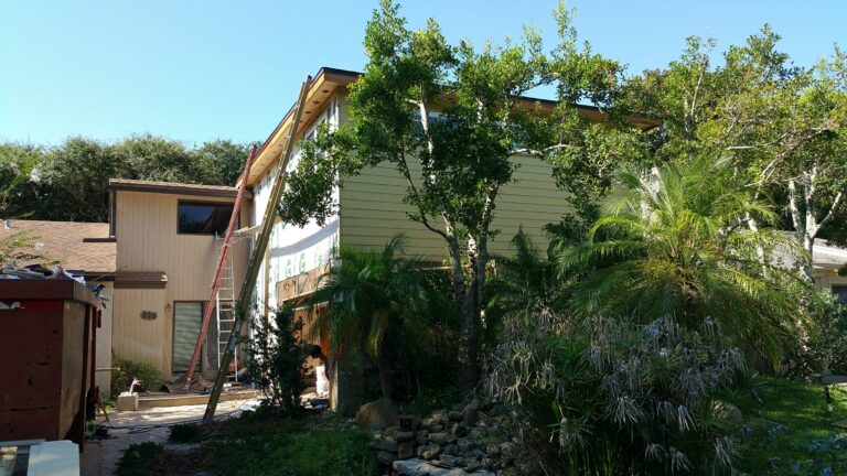 Master Suite above garage roofing and dry-in